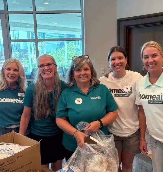 Freccia Construction team volunteering to assemble care kits for Austin nonprofits