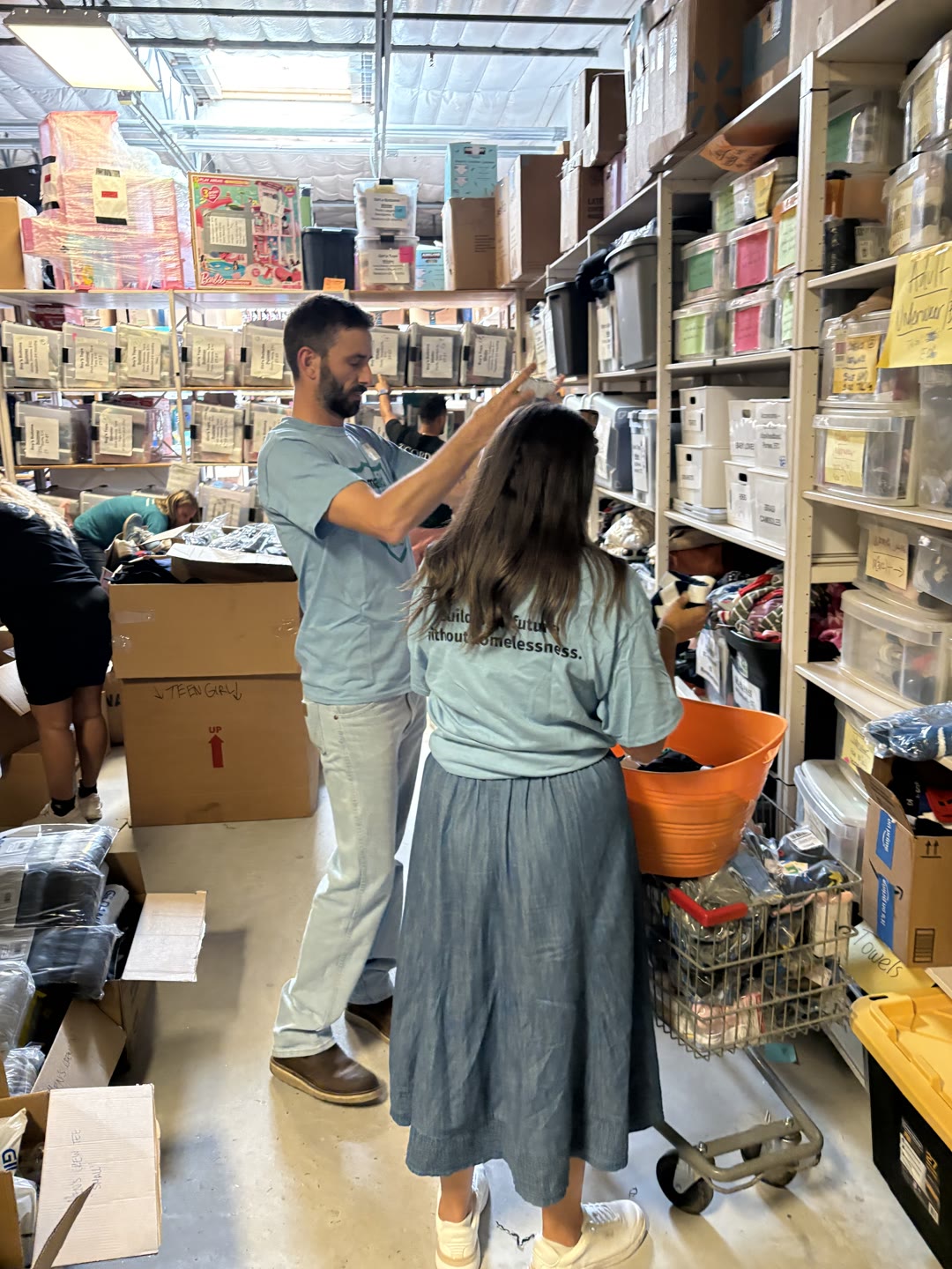 Sorting and organising donated essentials so families can find what they need
