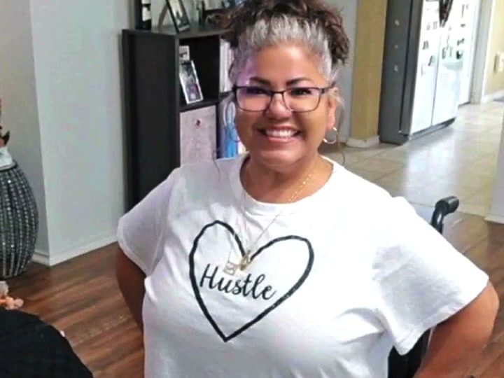 Tina Pesina at home, who served 23 years as an Austin police 911 dispatcher