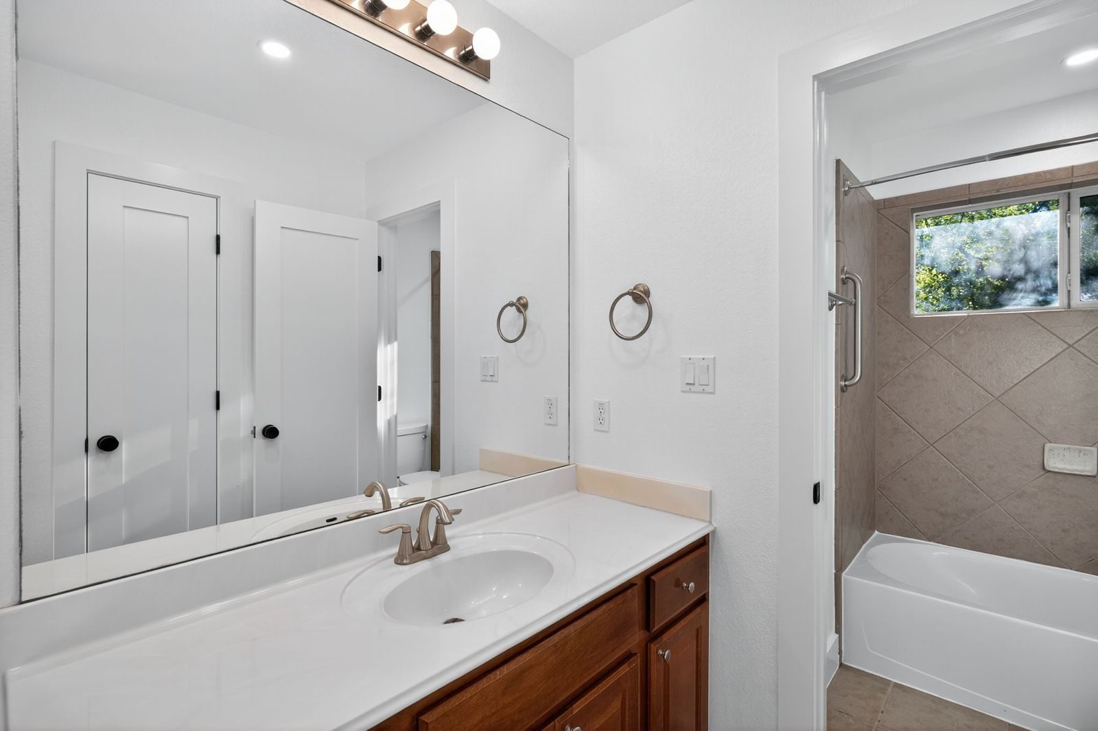 Along Creek Cove finished secondary bathroom vanity, Avery Ranch, Austin, TX