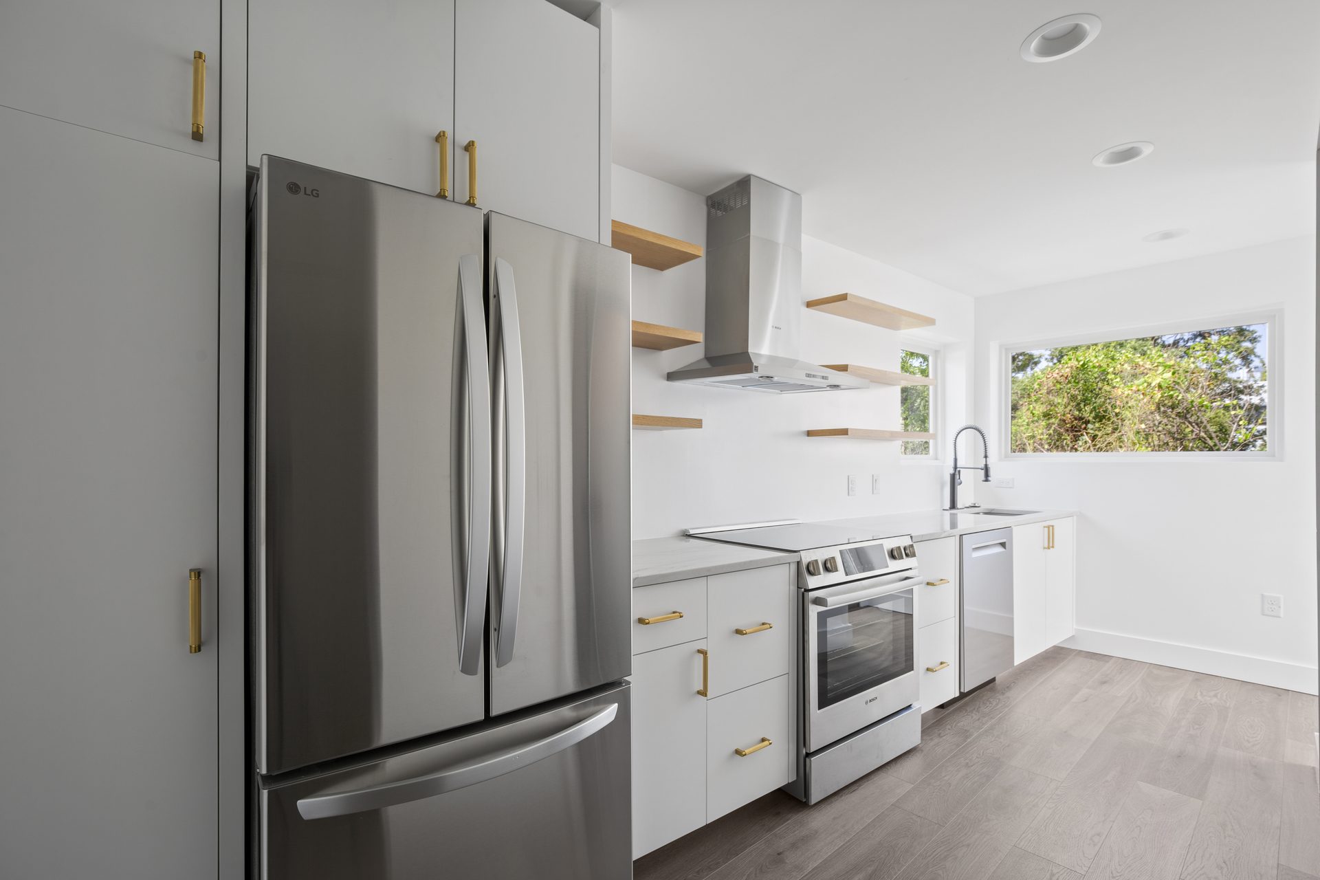 Rosewood custom new build, kitchen with open shelving, East Austin, TX