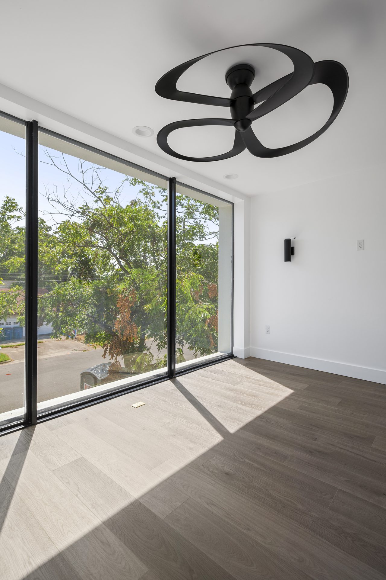 Rosewood custom new build, bedroom with floor-to-ceiling glass, East Austin, TX