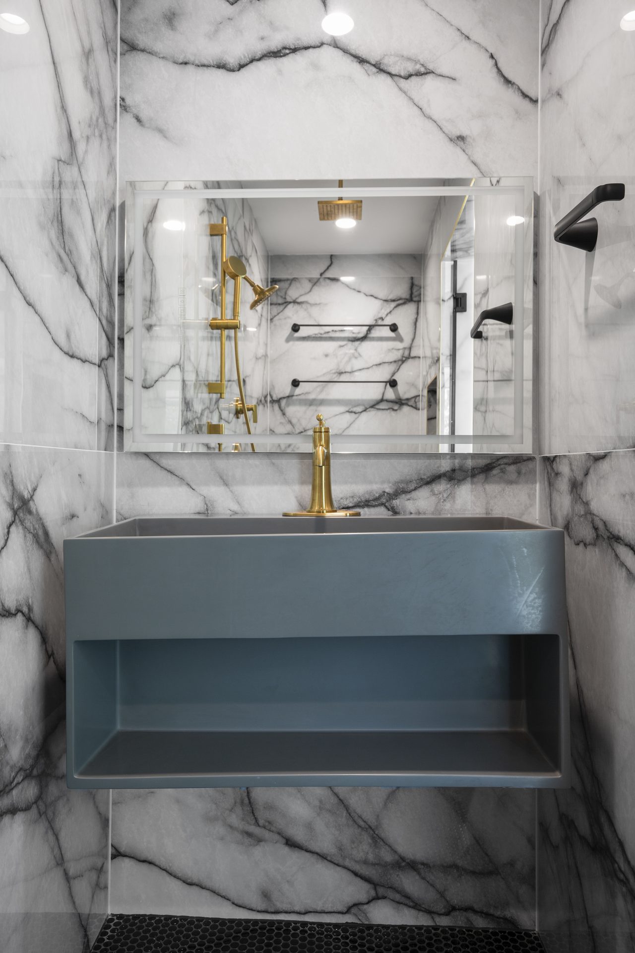 Rosewood custom new build, primary bathroom vanity with marble and brass fixtures, East Austin, TX