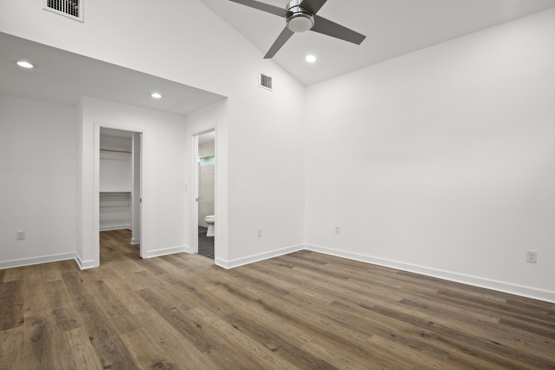 South Congress home addition, bedroom with closet and ensuite bath doors, Austin, TX