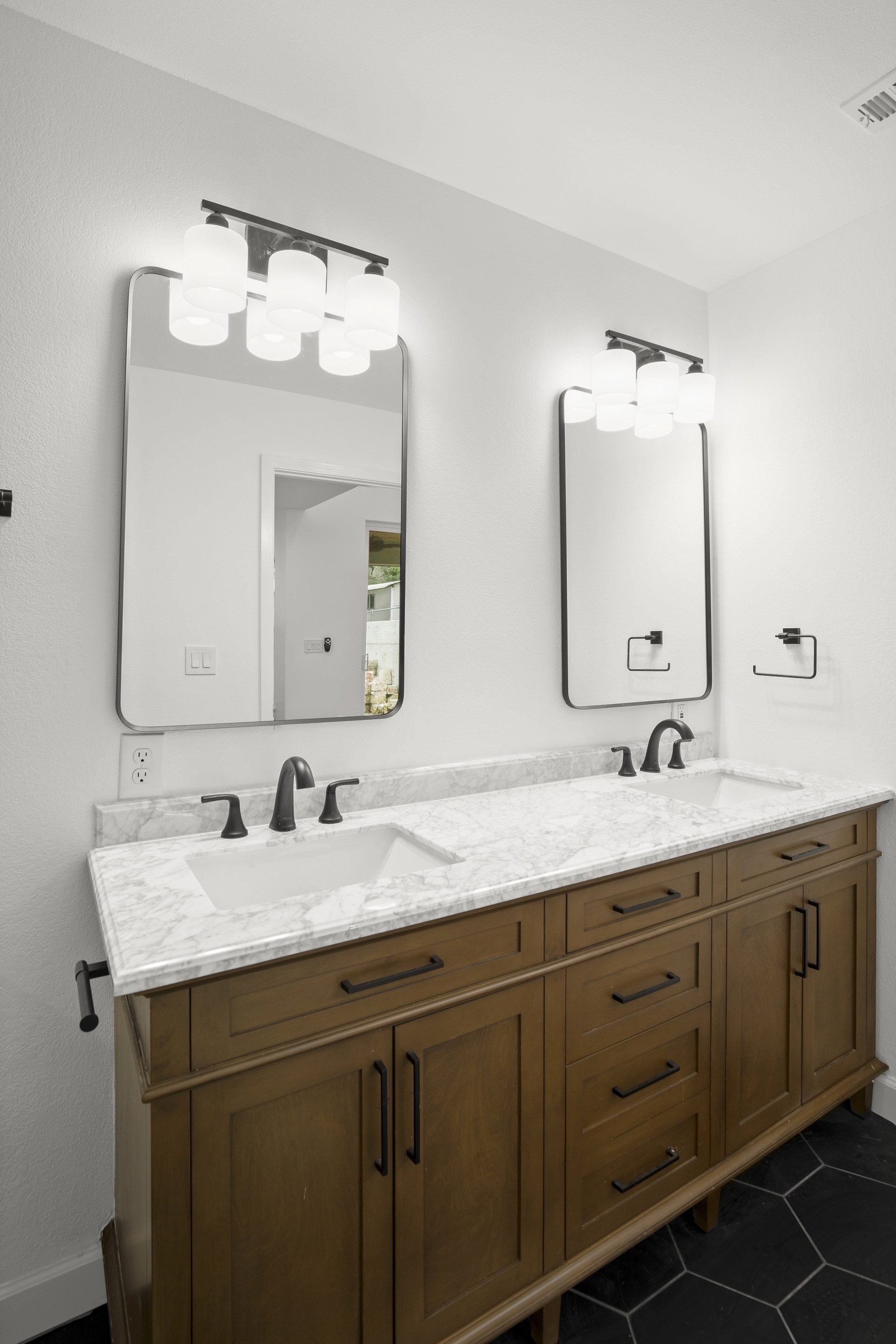 South Congress home addition, primary bathroom dual vanity with quartz countertop, Austin, TX