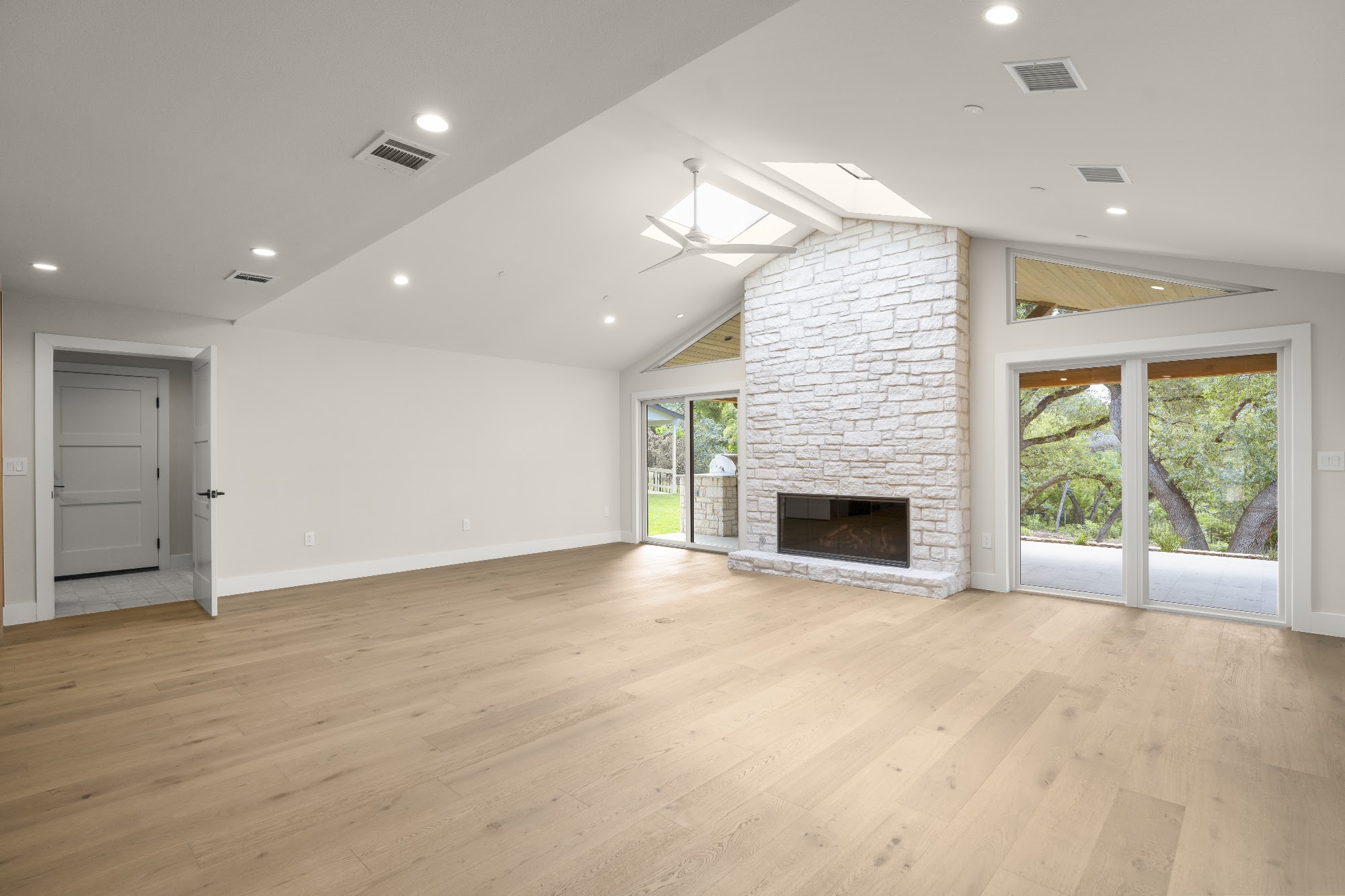 Castle Ridge finished living room with stone fireplace, Lost Creek, Austin, TX