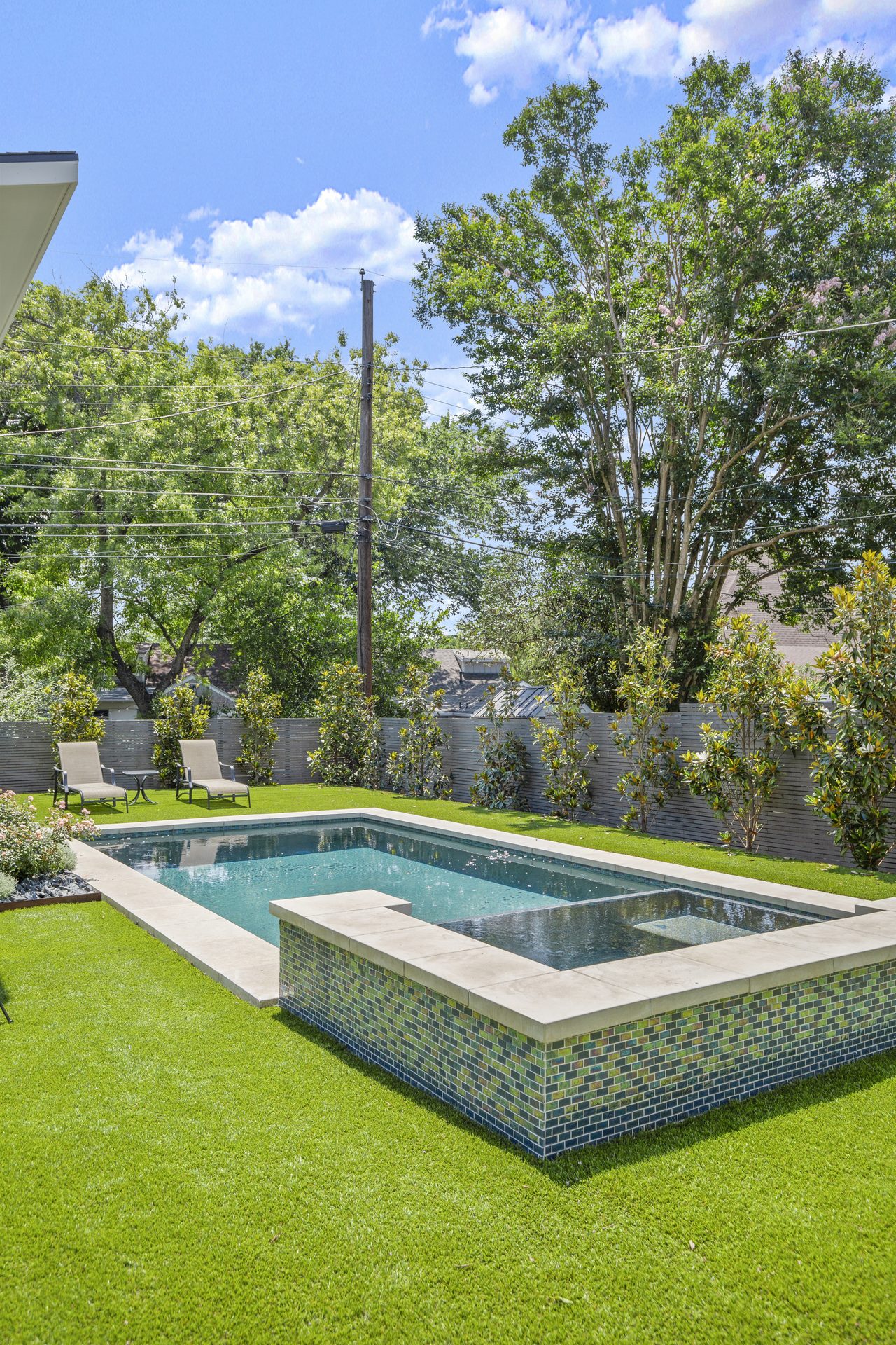 Tarrytown pool and outdoor living, pool and cabana with tree line, Austin, TX
