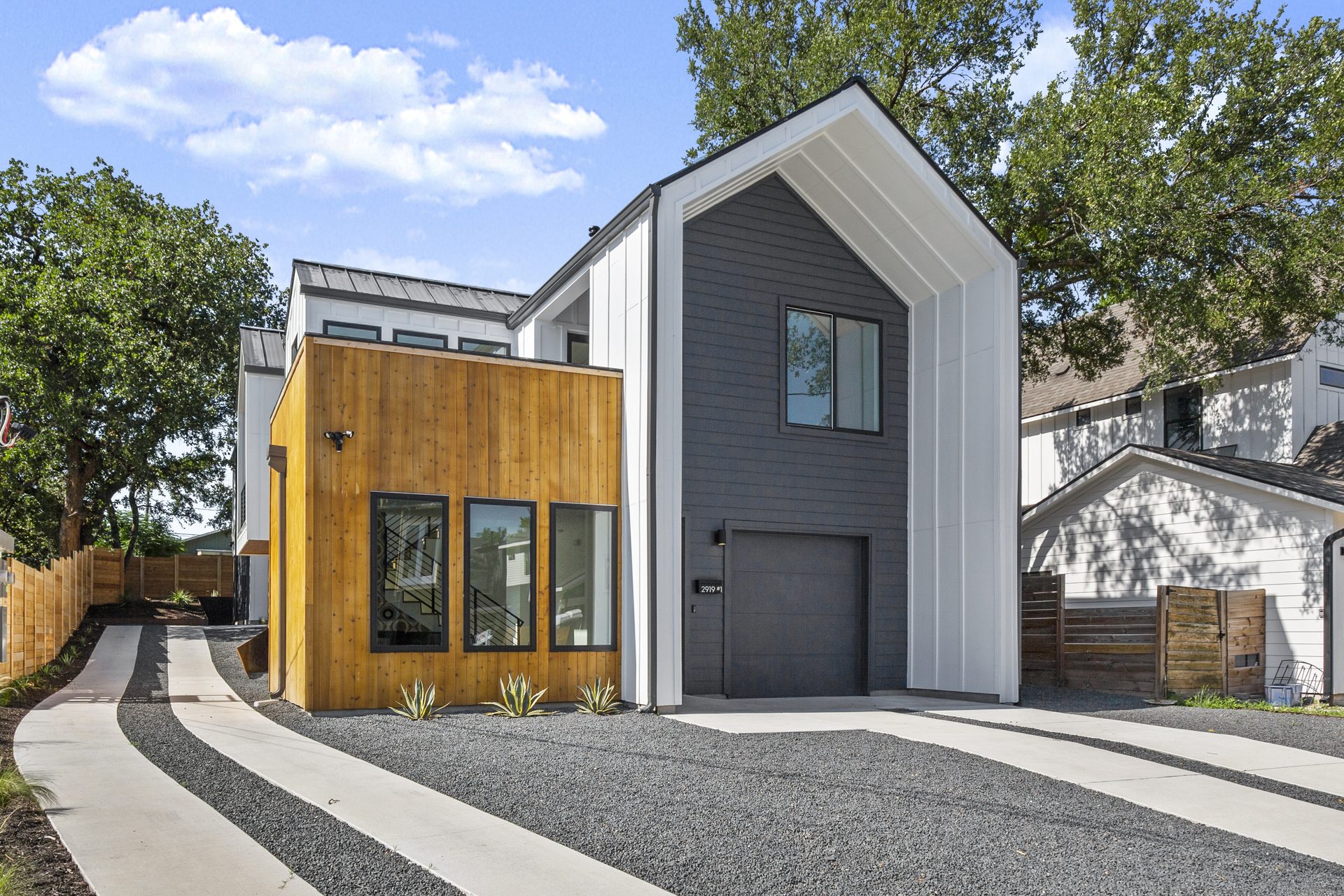 East 13th custom new build exterior by Freccia Construction, East Austin TX