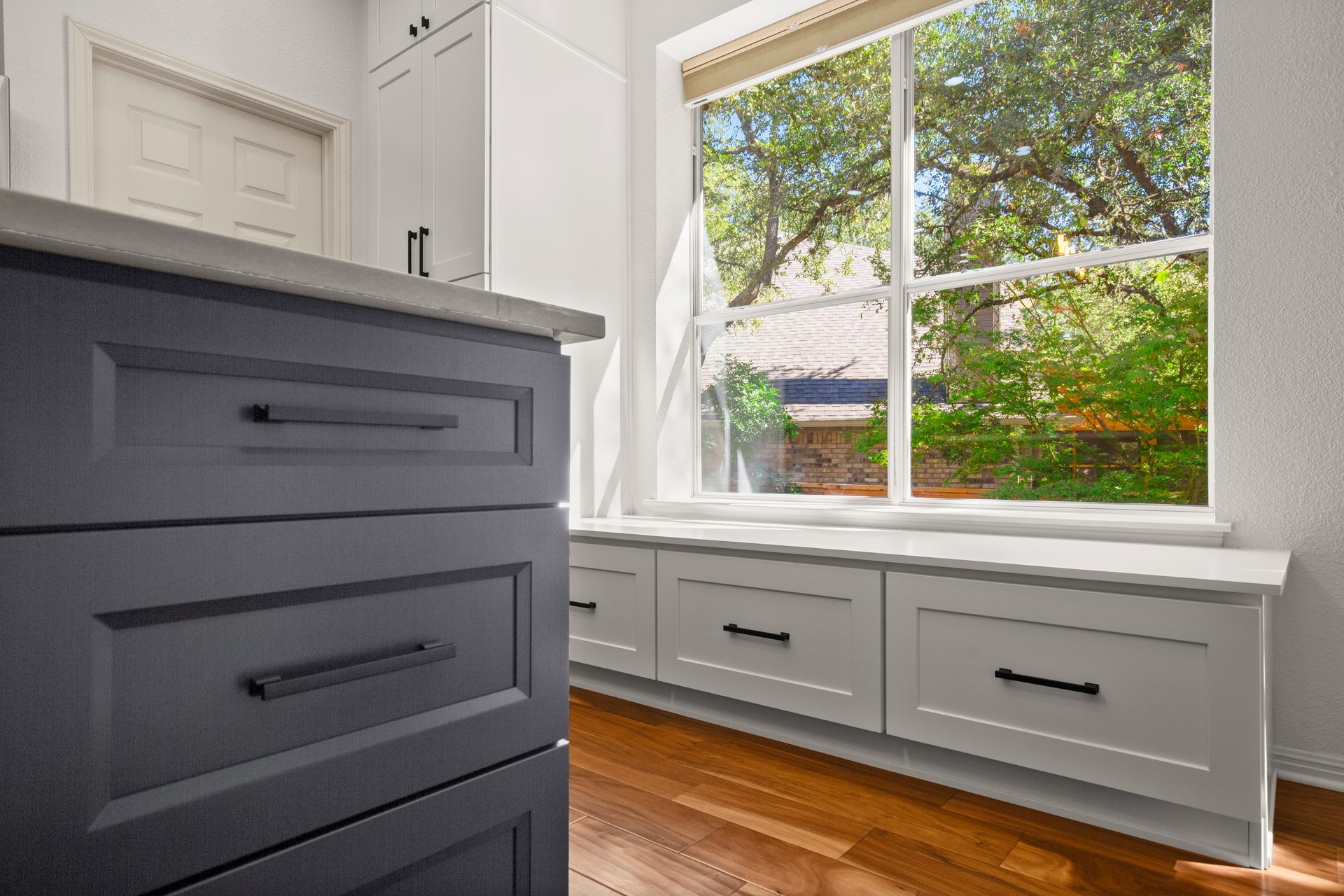 Oak Hill kitchen renovation, navy island drawer hardware detail, SW Austin, TX